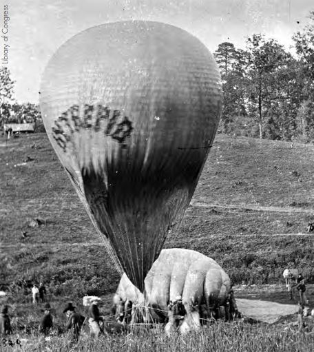 Union army Balloon Corps ground crew replenishing the balloon Intrepid at Fair Oaks, Virginia, May 1862, during the American Civil War.