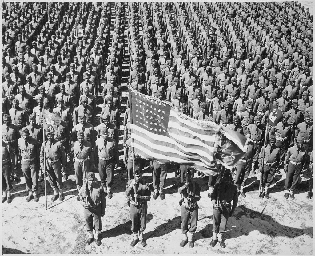 Large group of Black soldiers standing in formation 