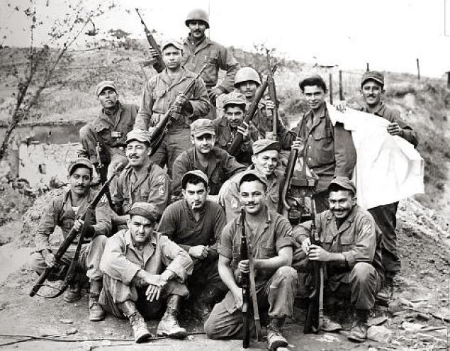 Group of Soldiers posed with weapons