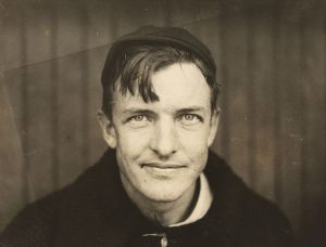 Christy Mathewson wearing a hat and sweater