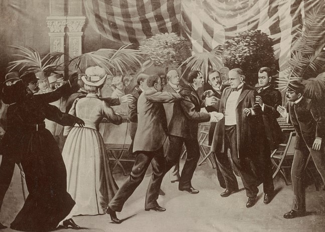 Czolgosz shoots President McKinley with a concealed revolver, at Pan-American Exposition reception.