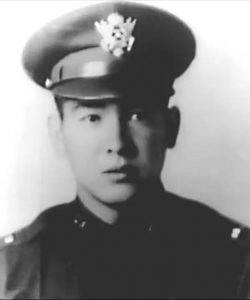 Francis Wai in uniform, head and shoulders. 