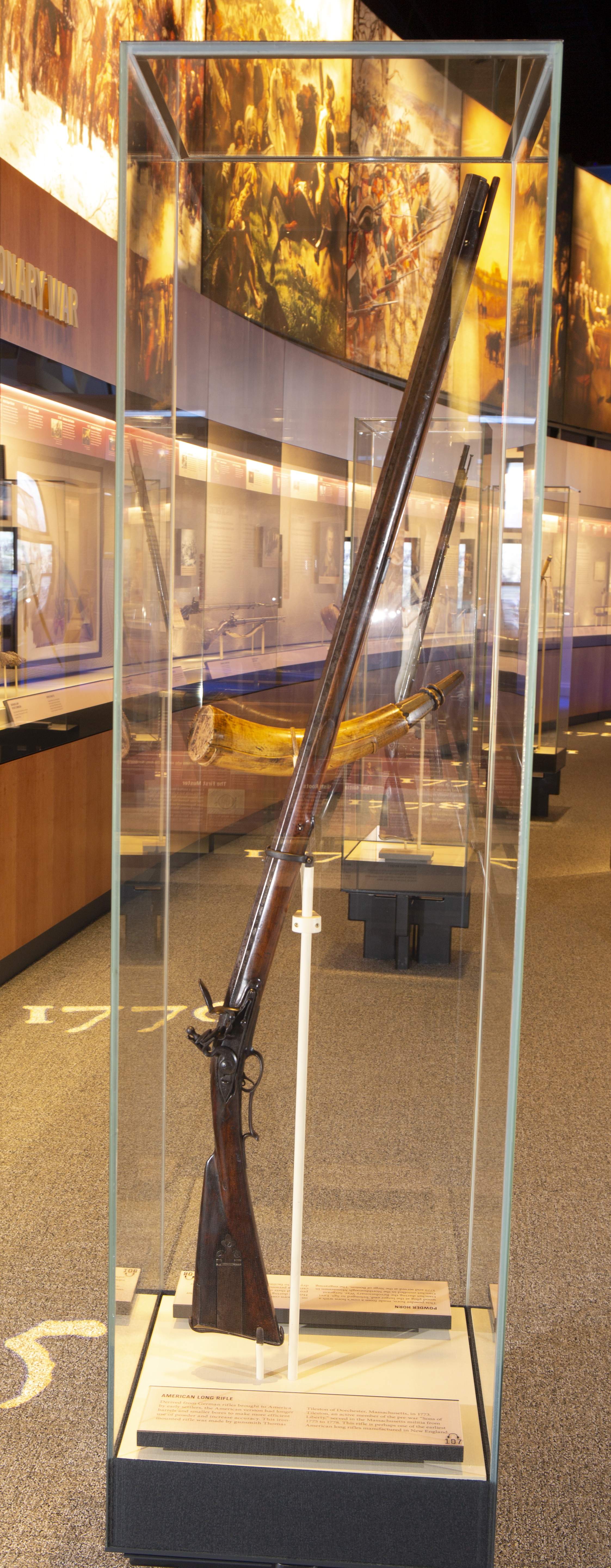Derived from German rifles brought to America by early settlers, the American version had longer barrels and smaller bores to make more efficient use of powder and increase accuracy. This iron-mounted rifle was made by gunsmith Thomas Tileston of Dorchester, Massachusetts, in 1773. Tileston, an active member of the pre-war “Sons of Liberty,” served in the Massachusetts militia from 1775 to 1778. This rifle is perhaps one of the earliest American long rifles manufactured in New England.