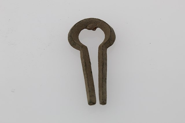 Brass jaw harp, reportedly found at Fort Ticonderoga during the 20th century reconstruction. Object ID INV4323. Courtesy of The Fort Ticonderoga Museum Collection.
