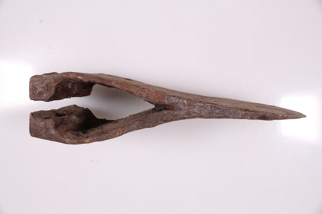 Complete ax with triangular eye. Poll is split. Object ID 2017.B.64.611. Courtesy of The Fort Museum Collection.