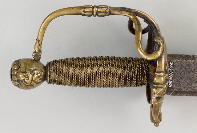 British cavalry officer’s broadsword having a wide double-edge 31.75″ blade with three narrow fullers, marked “Andrea Ferara.” Object ID 2009.0098.069. Courtesy of The Fort Ticonderoga Museum Collection.