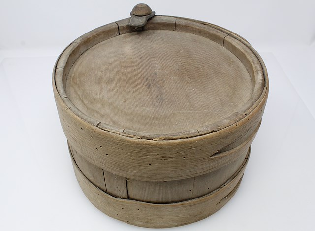 Wooden canteen consisting of 12 staves held together by two wooden bands. Object ID 2019.FIC.114. Courtesy of The Fort Ticonderoga Museum Collection.