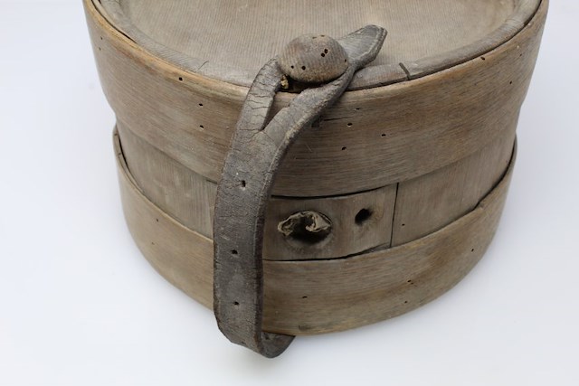 Wooden canteen consisting of 12 staves held together by two wooden bands. Object ID 2019.FIC.114. Courtesy of The Fort Ticonderoga Museum Collection.