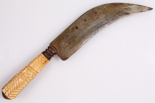 Curved knife with bone handle and leather sheath. Object ID 2015.2.1-2. Courtesy of The Fort Ticonderoga Museum Collection.